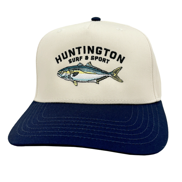 white & blue hat with text "huntington surf and sport" and image of yellowtail amberjack